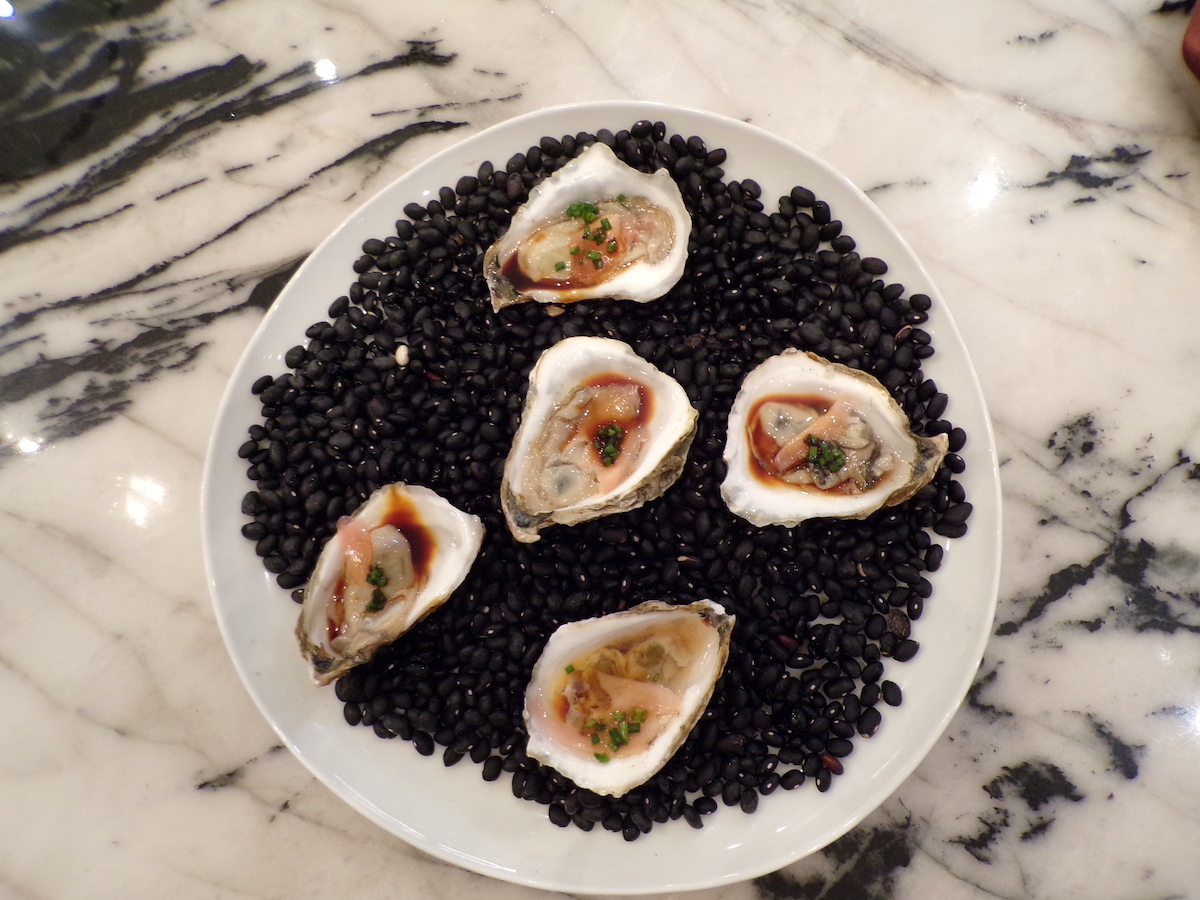 photo of Oysters Oishi Recipe served on beans